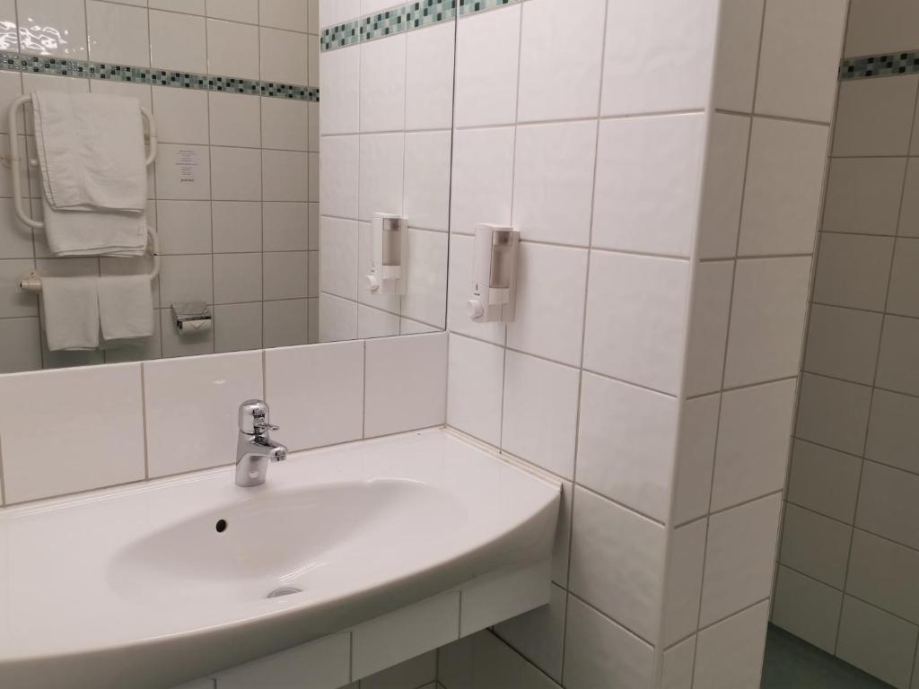 Koupelna v ubytování Hotel Lorensberg