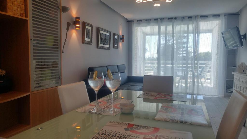 A television and/or entertainment centre at Aster Apartamento