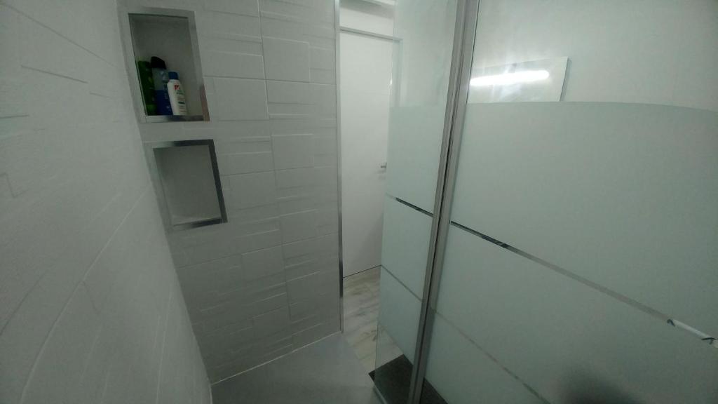 A bathroom at Aster Apartamento