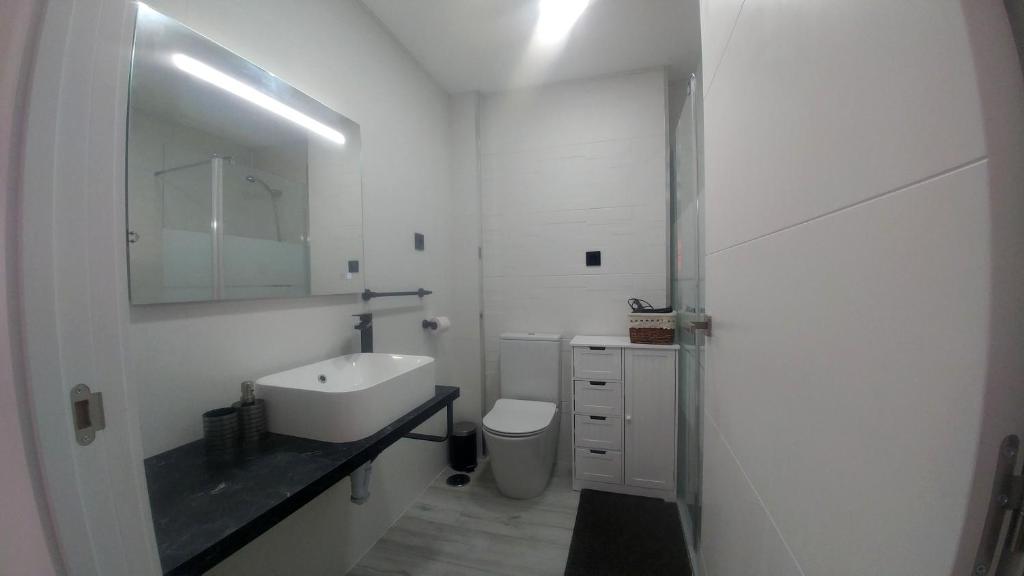 A bathroom at Aster Apartamento