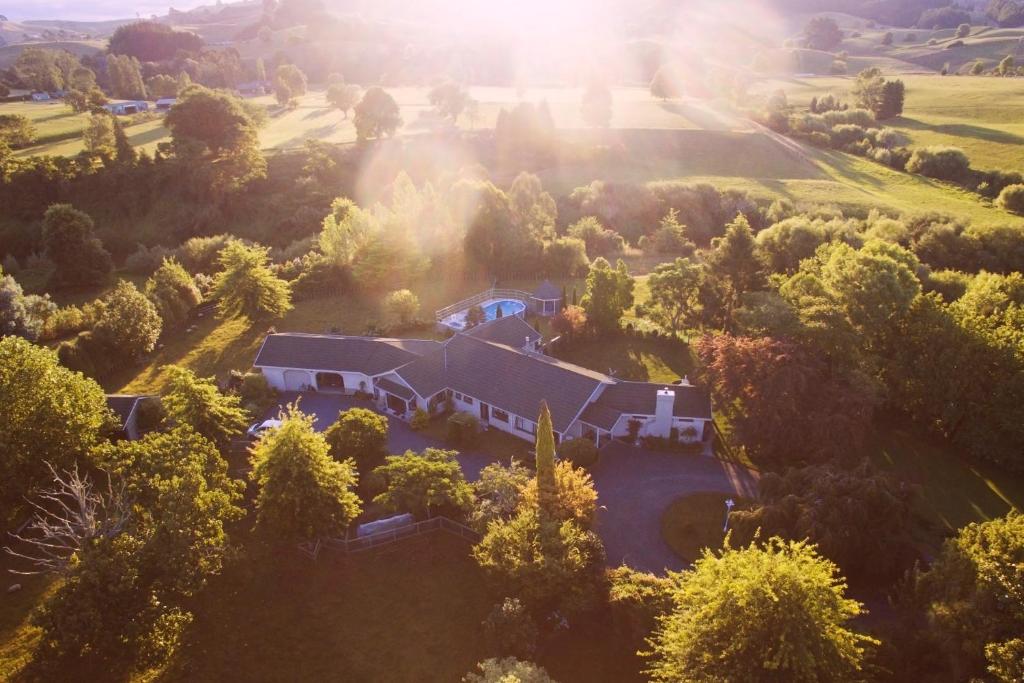 an aerial view of a house in a field at Somersal Bed & Breakfast in Pirongia