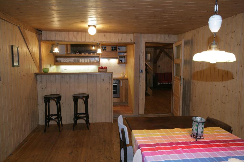 Kuchyň nebo kuchyňský kout v ubytování Apartmány Chalupa u Floriánka