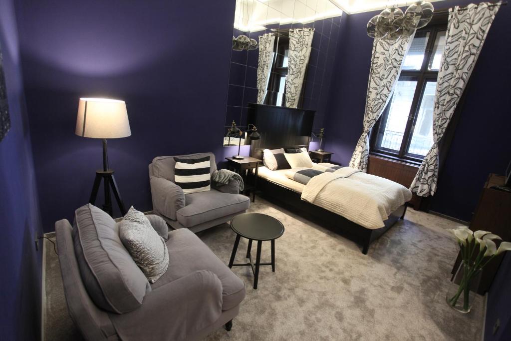 Posteľ alebo postele v izbe v ubytovaní Ambassador Apartment