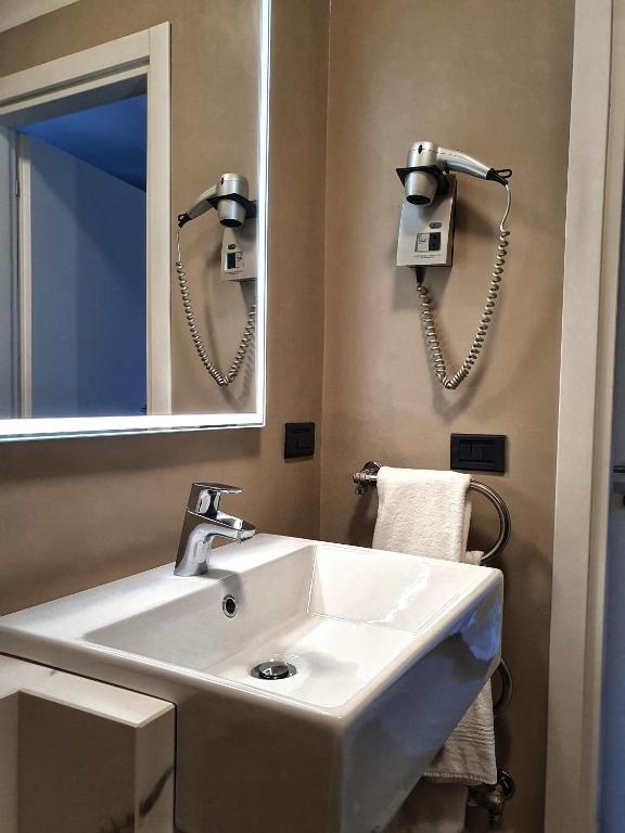 Koupelna v ubytování Hotel Desenzano