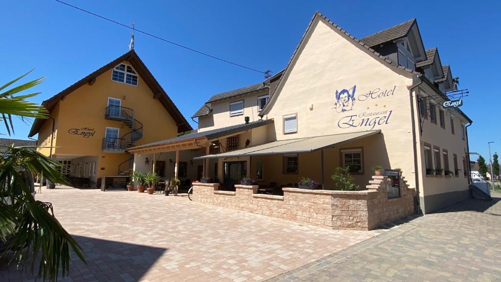 a building with a sign on the side of it at Hotel Engel in Kappel-Grafenhausen