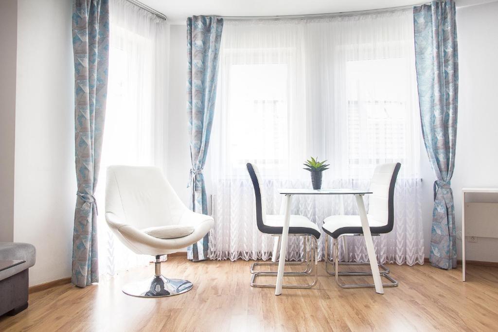 Posedenie v ubytovaní AL-DOM apartamenty Apartament Olymp 308