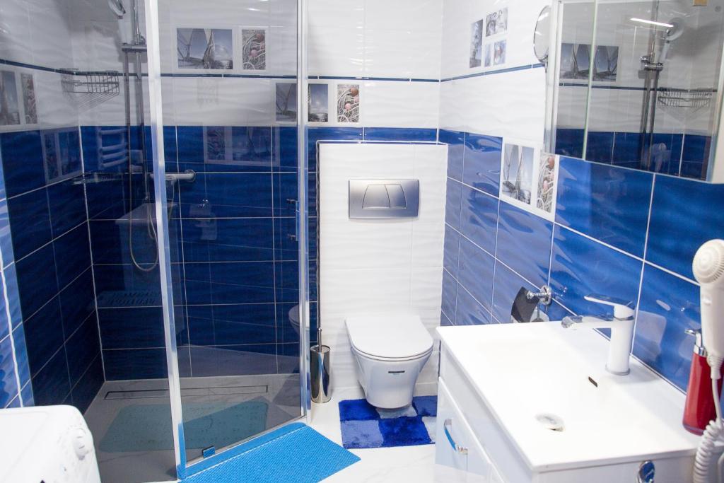 Kúpeľňa v ubytovaní AL-DOM apartamenty Apartament Olymp 308