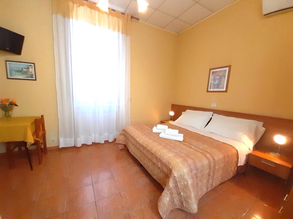 Postel nebo postele na pokoji v ubytování Hotel Alba Torino centro