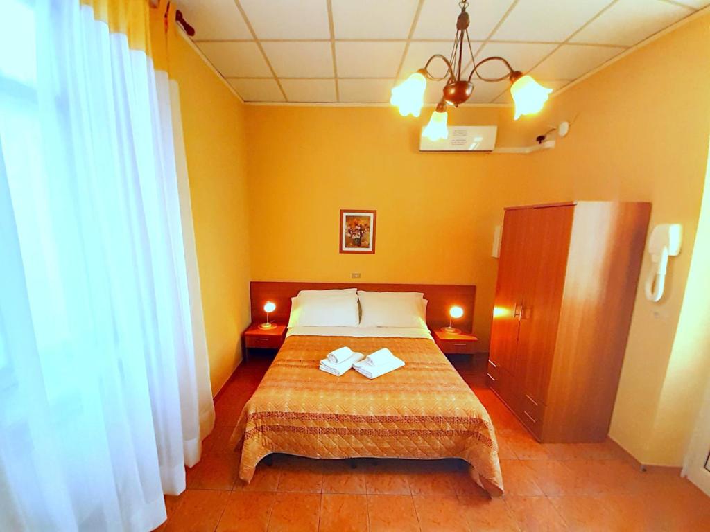 Postel nebo postele na pokoji v ubytování Hotel Alba Torino centro