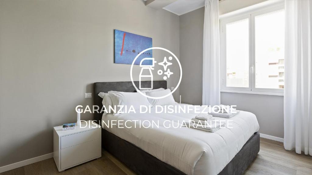 A bed or beds in a room at Italianway - Largo Allegri 4