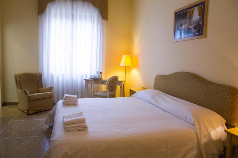 Posteľ alebo postele v izbe v ubytovaní Residence Ancona