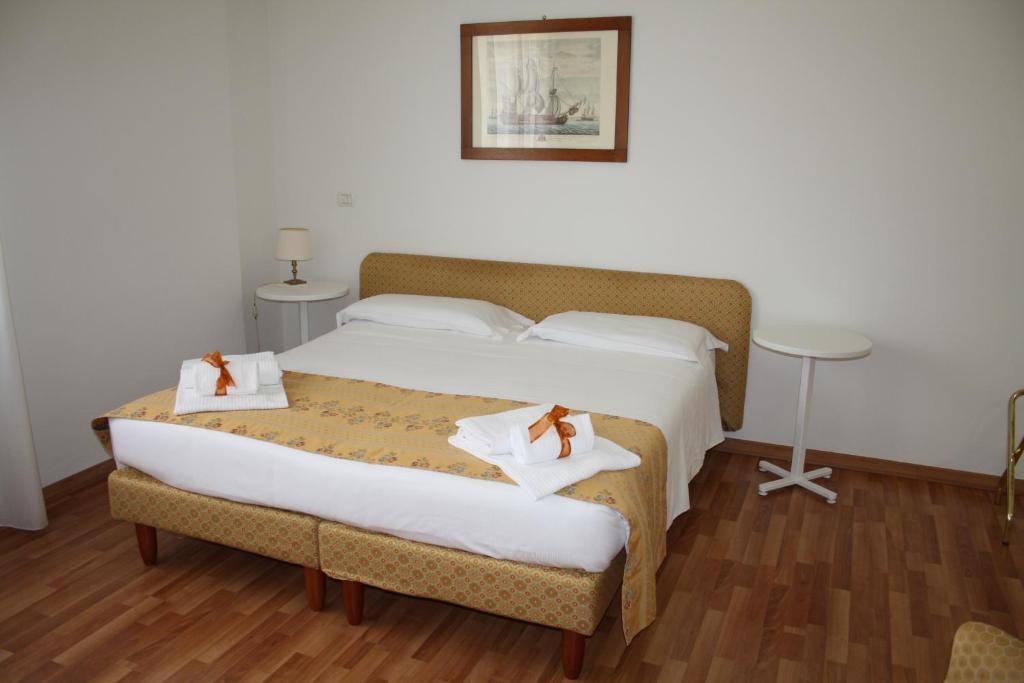 Posteľ alebo postele v izbe v ubytovaní Residence Ancona