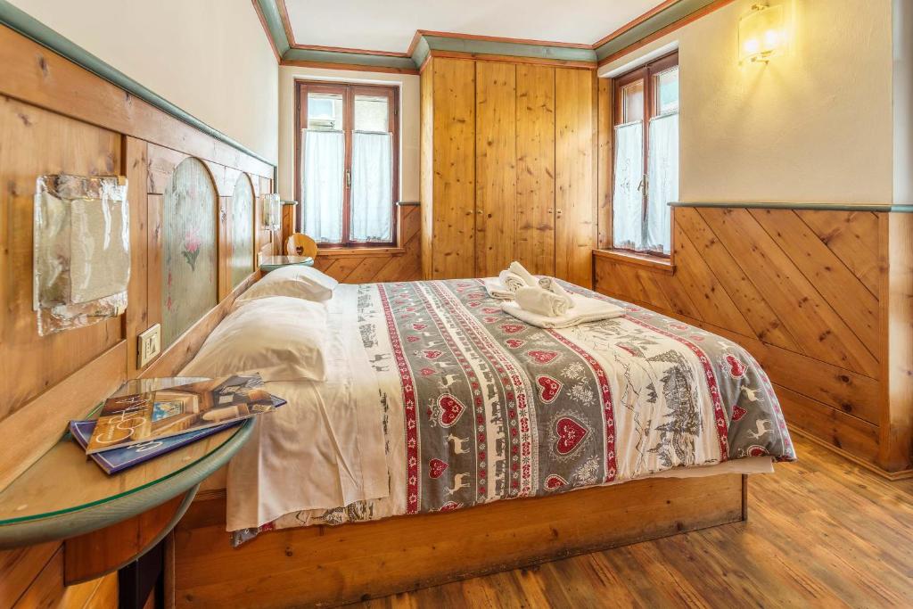 Postel nebo postele na pokoji v ubytování Hotel Alemagna
