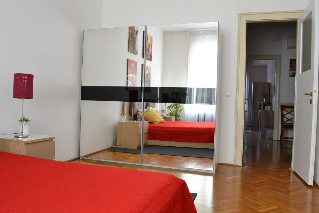 Posteľ alebo postele v izbe v ubytovaní Paprika Apartment Grand