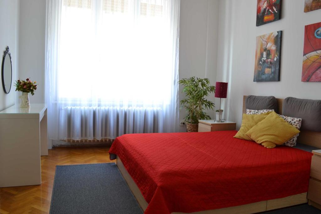 Posteľ alebo postele v izbe v ubytovaní Paprika Apartment Grand