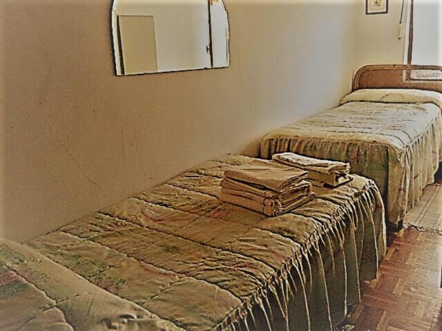 מיטה או מיטות בחדר ב-Casa rural 47, La Acebosa, San Vicente de la Barquera