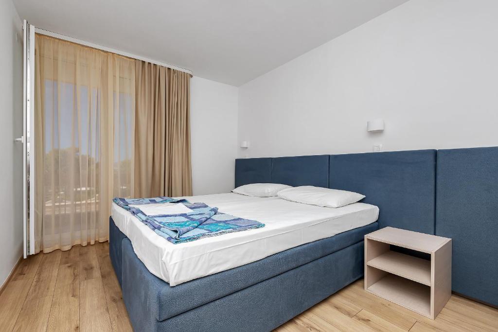 Krevet ili kreveti u jedinici u okviru objekta Hotel Alem