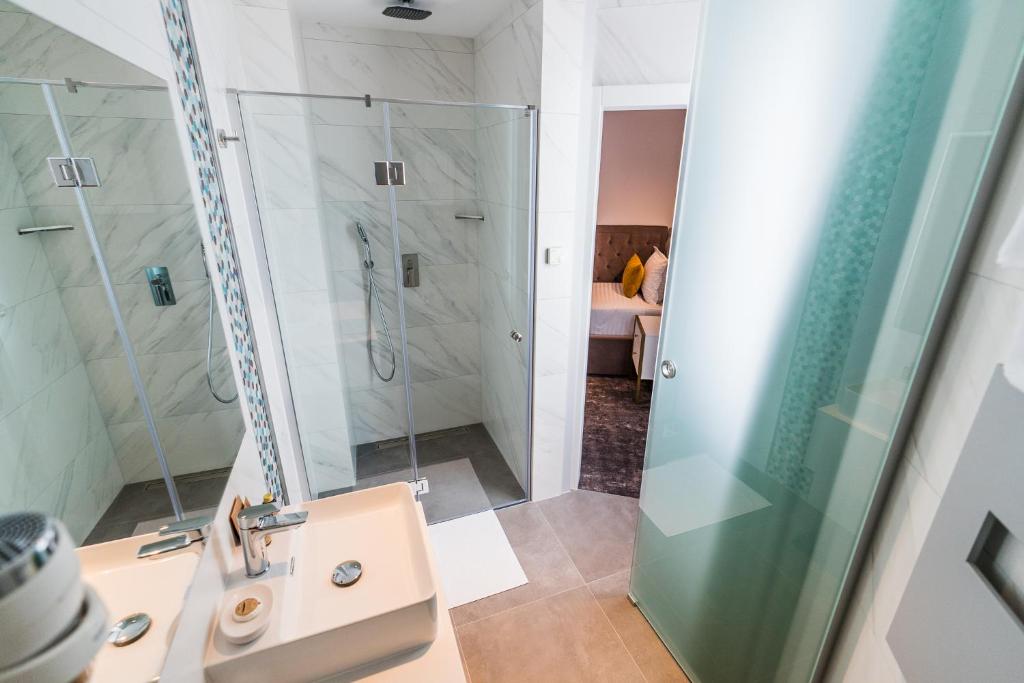 Koupelna v ubytování Hotel Aventus