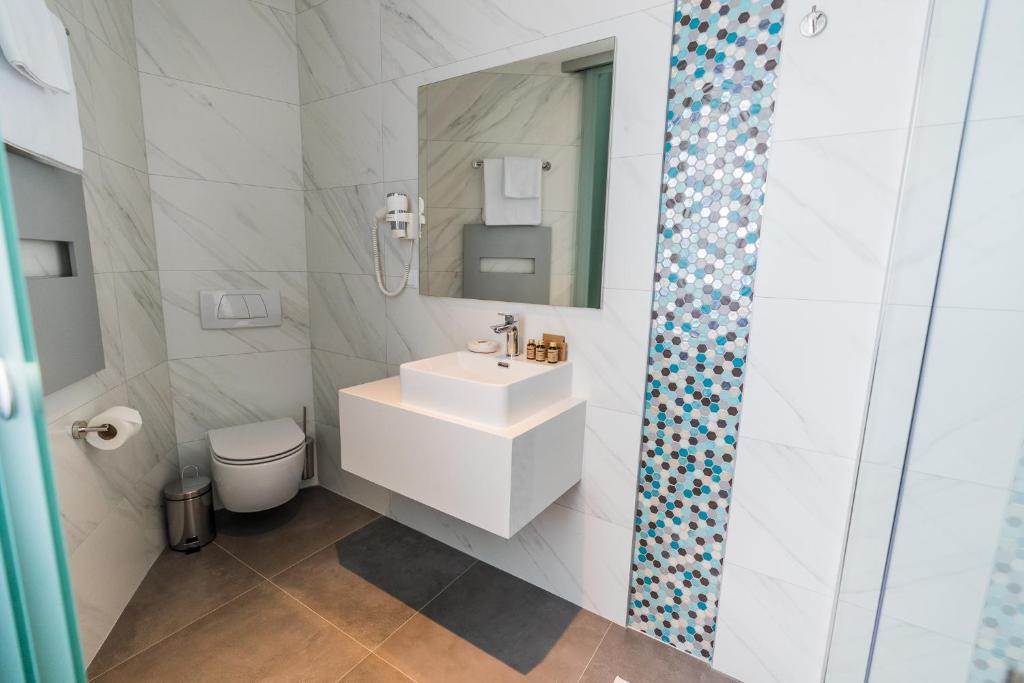 Koupelna v ubytování Hotel Aventus