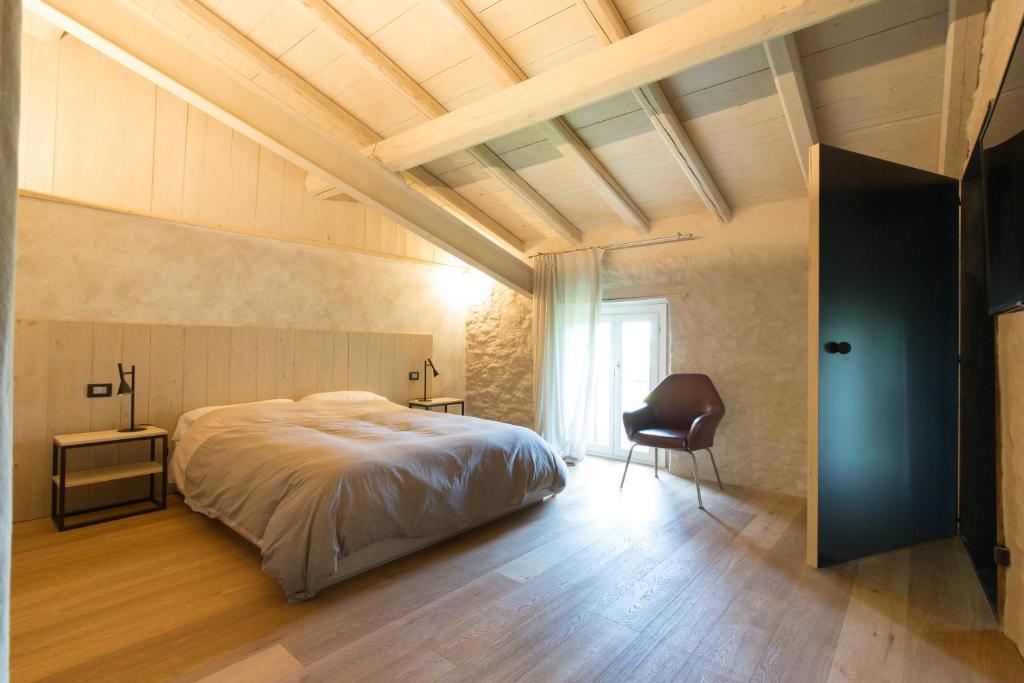 Postel nebo postele na pokoji v ubytování VILLA SACCOMANI