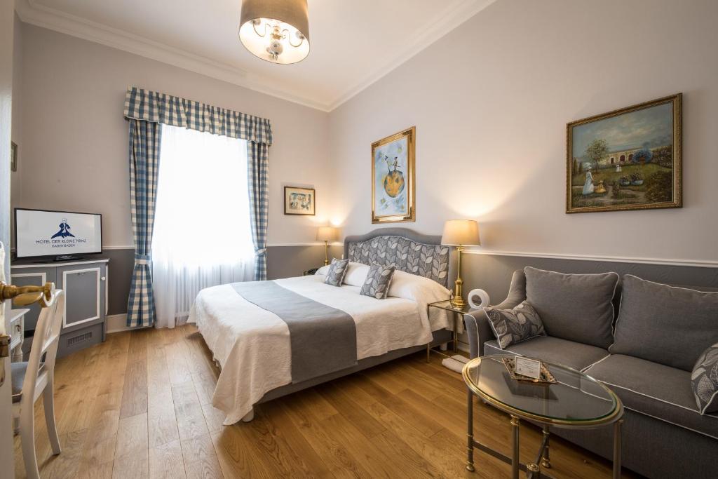 Postel nebo postele na pokoji v ubytování Hotel Der Kleine Prinz