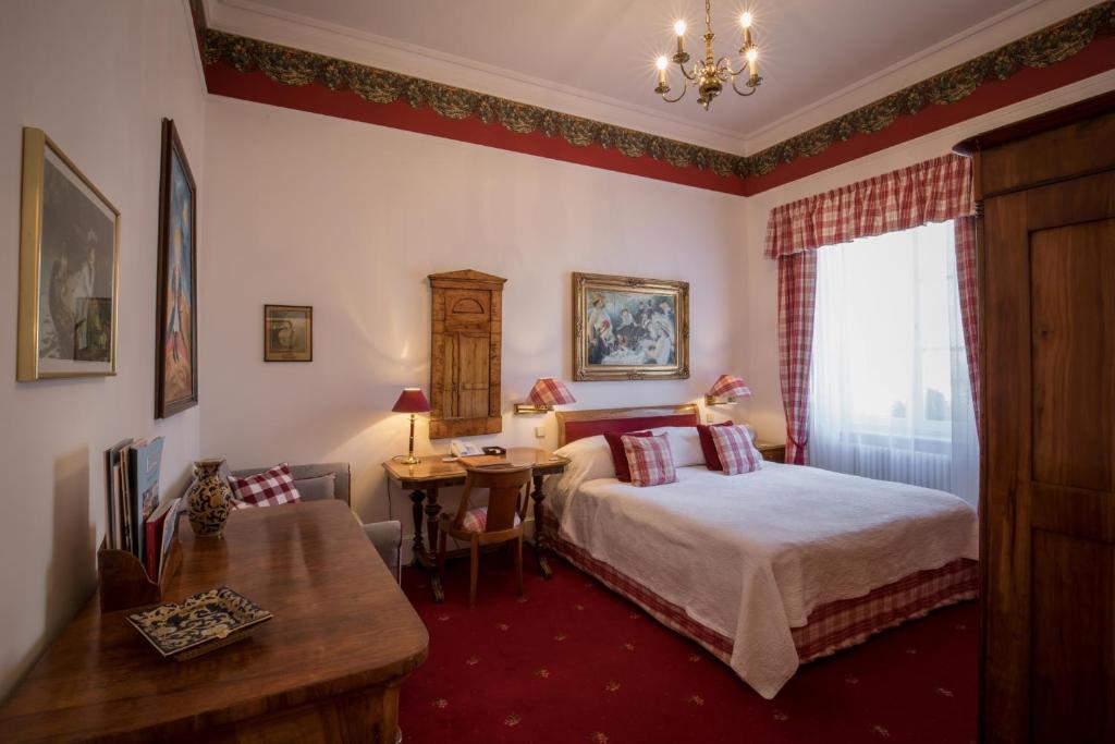 Postel nebo postele na pokoji v ubytování Hotel Der Kleine Prinz