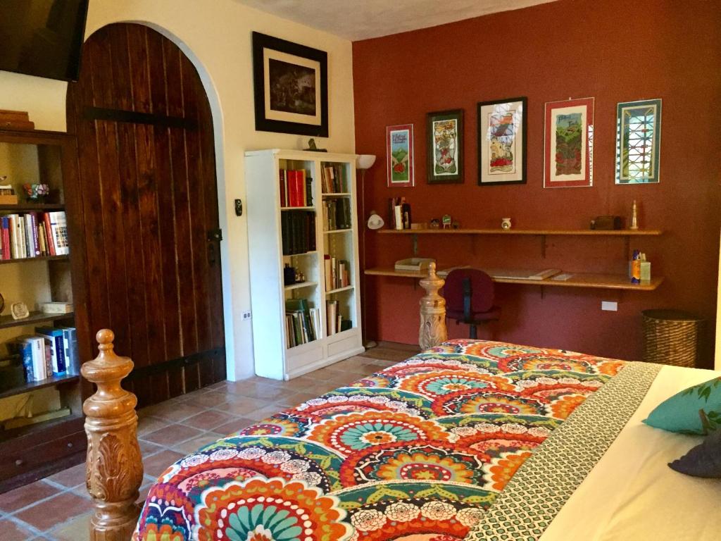 Postel nebo postele na pokoji v ubytování Villa Vassallo