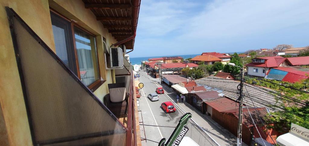 a view of a city street from a building at LA CANAPELE ROCK in Vama Veche