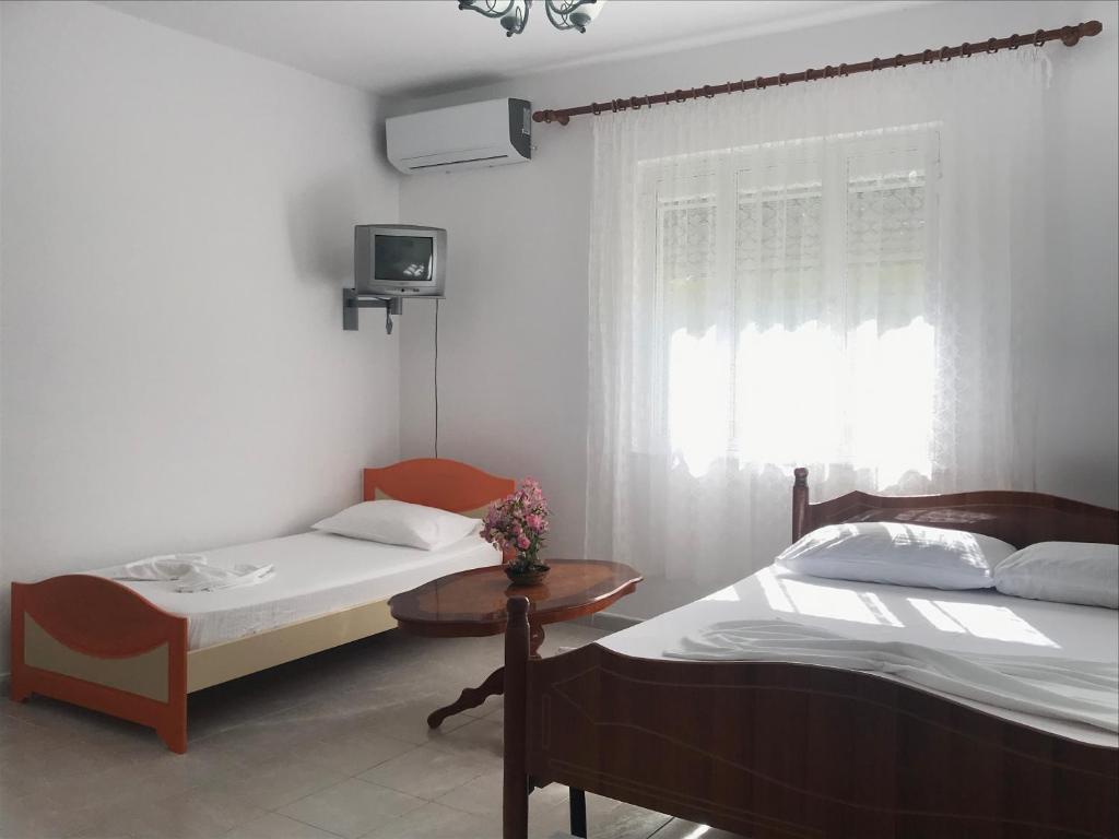 Postel nebo postele na pokoji v ubytování COLOMBO