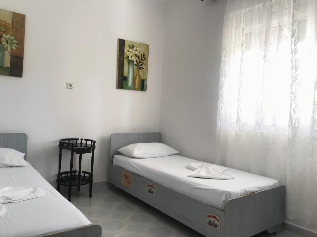 Postel nebo postele na pokoji v ubytování COLOMBO