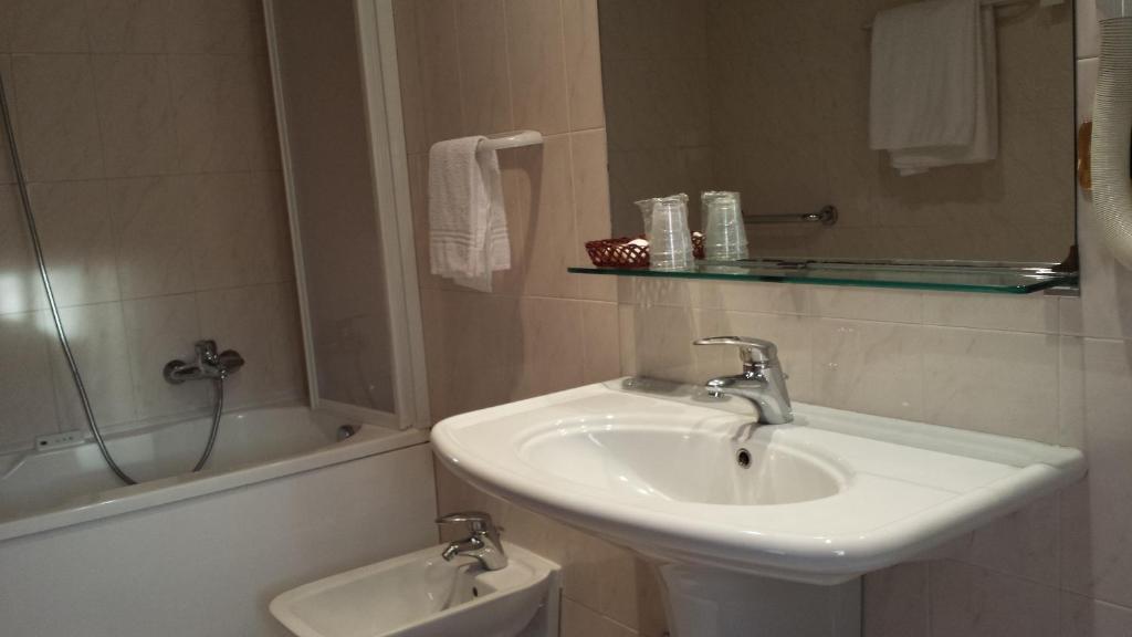 Koupelna v ubytování Hotel Corallo