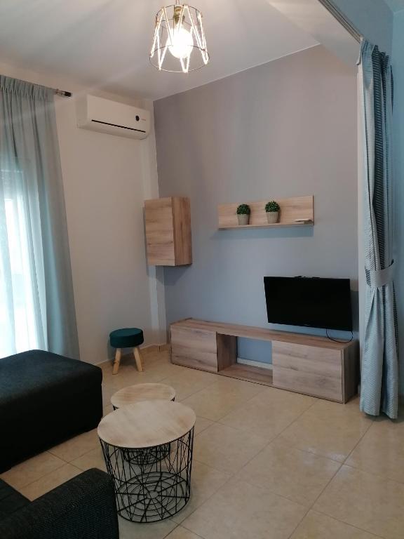 A television and/or entertainment centre at Green Island Residence
