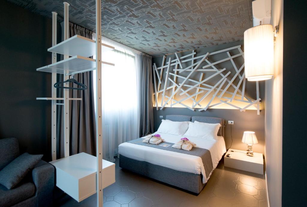 Postel nebo postele na pokoji v ubytování Art B&B Design