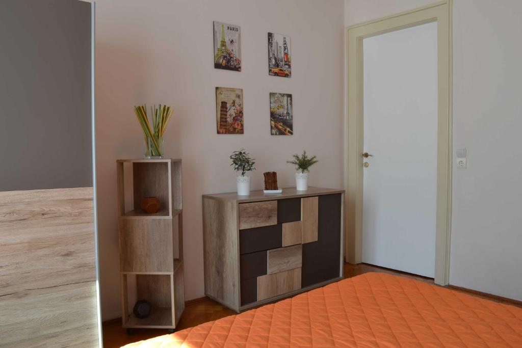Posteľ alebo postele v izbe v ubytovaní Paprika Apartment Grand