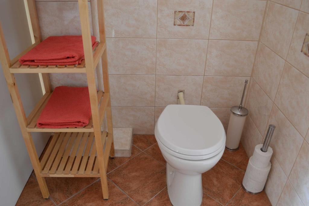 Kúpeľňa v ubytovaní Paprika Apartment Grand