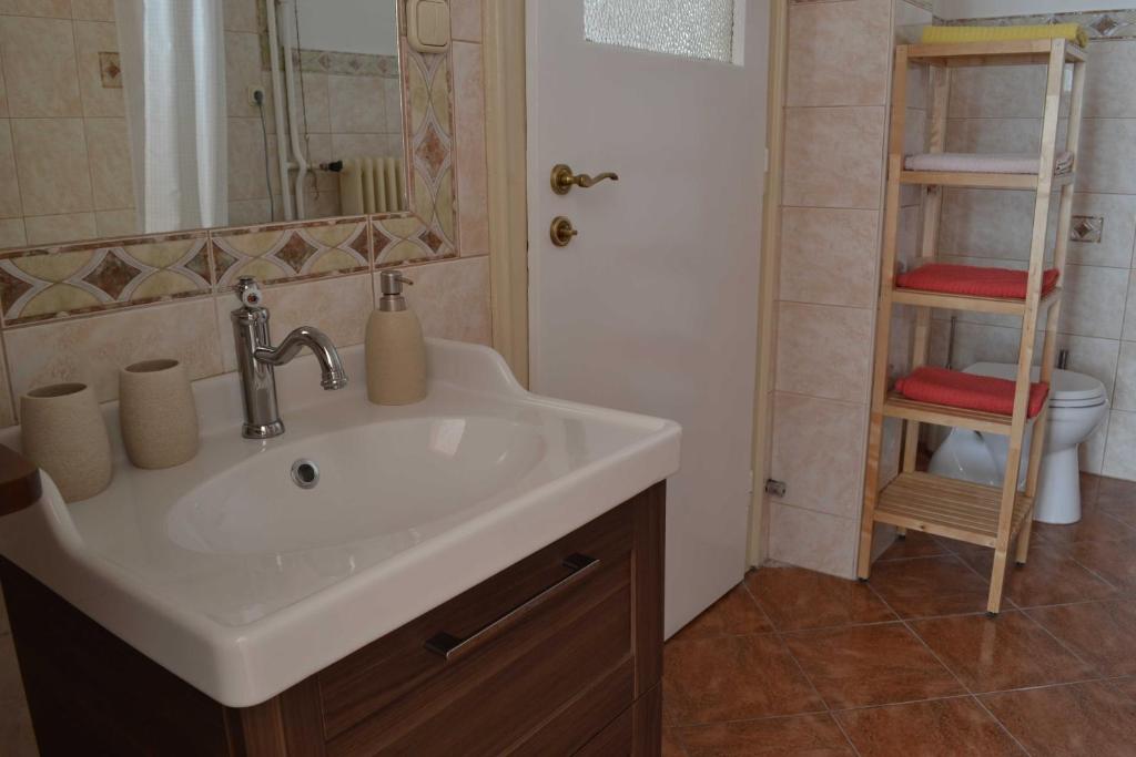 Kúpeľňa v ubytovaní Paprika Apartment Grand