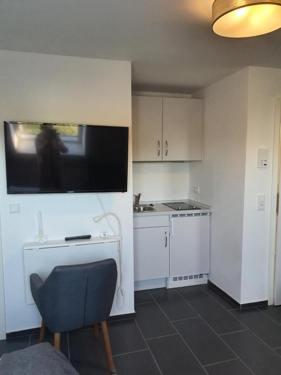 Kuchyň nebo kuchyňský kout v ubytování Nordsee-Pension Dagebüll