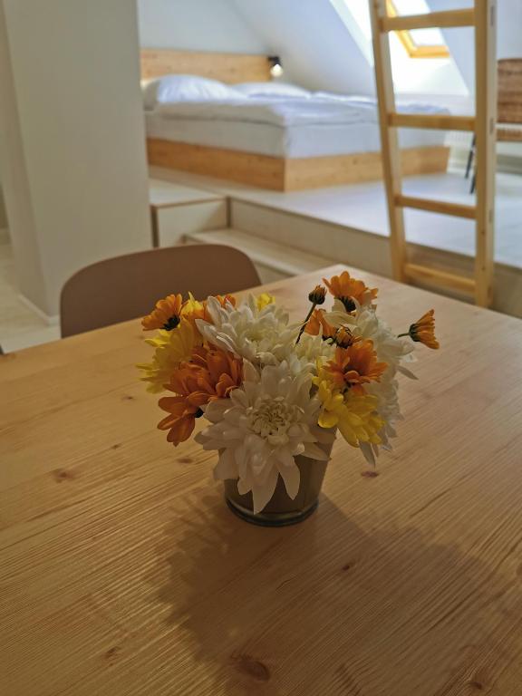 Postel nebo postele na pokoji v ubytování Apartmány Slunce