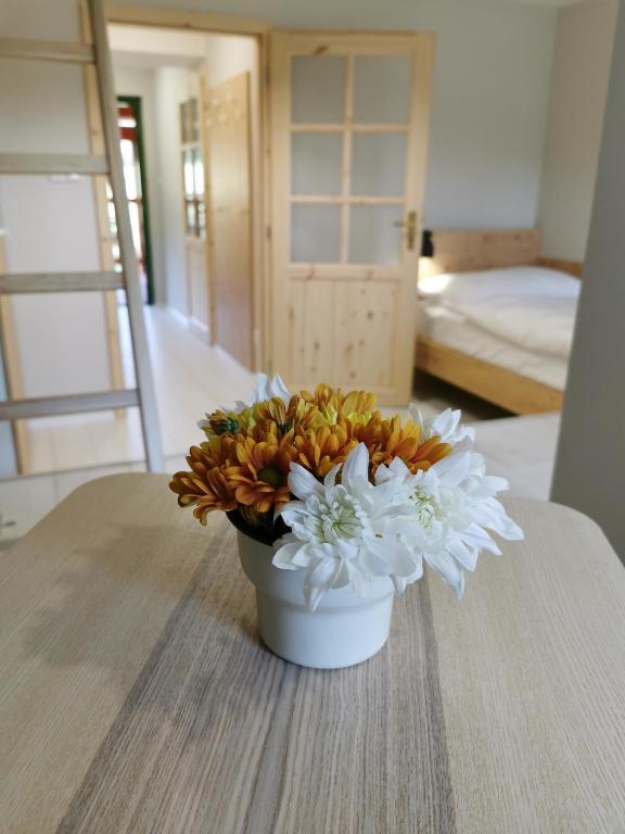 Postel nebo postele na pokoji v ubytování Apartmány Slunce