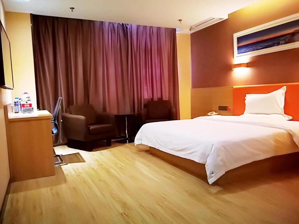 เตียงในห้องที่ 7 Days Premium Linfen Pingyang South Street Branch