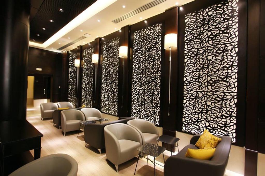 Posezení v ubytování Le Corail Suites Hotel