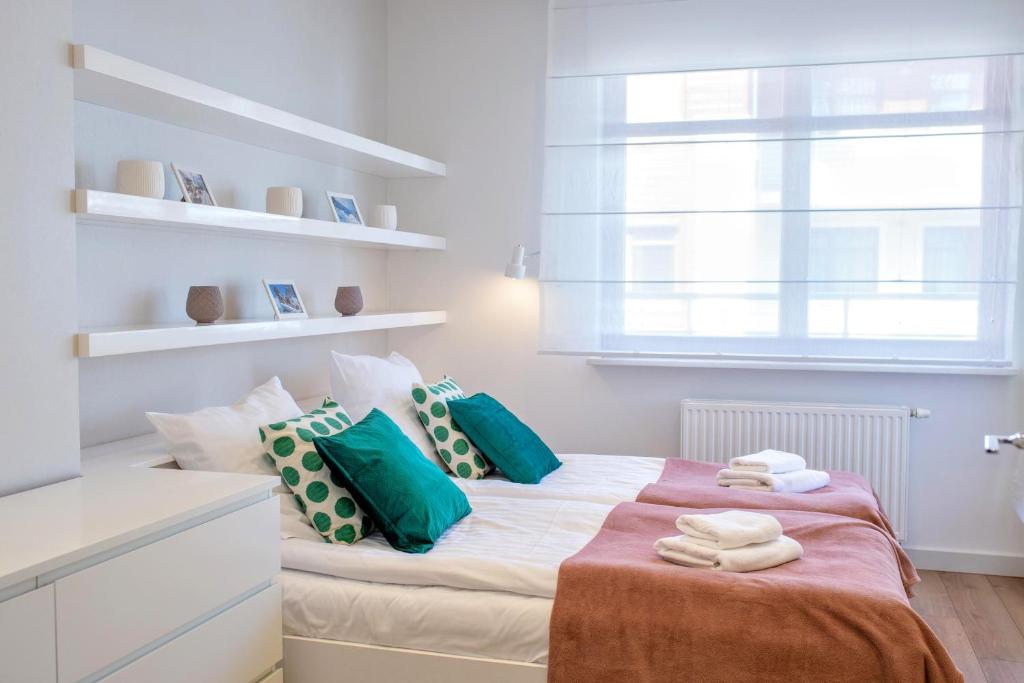 Posteľ alebo postele v izbe v ubytovaní Comfy Apartments - Wypoczynkowa Lux