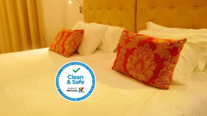 
Ein Bett oder Betten in einem Zimmer der Unterkunft Lisbon City Apartments & Suites by City Hotels
