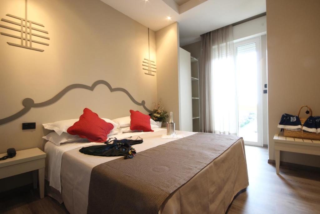 Postel nebo postele na pokoji v ubytování Hotel Arabel