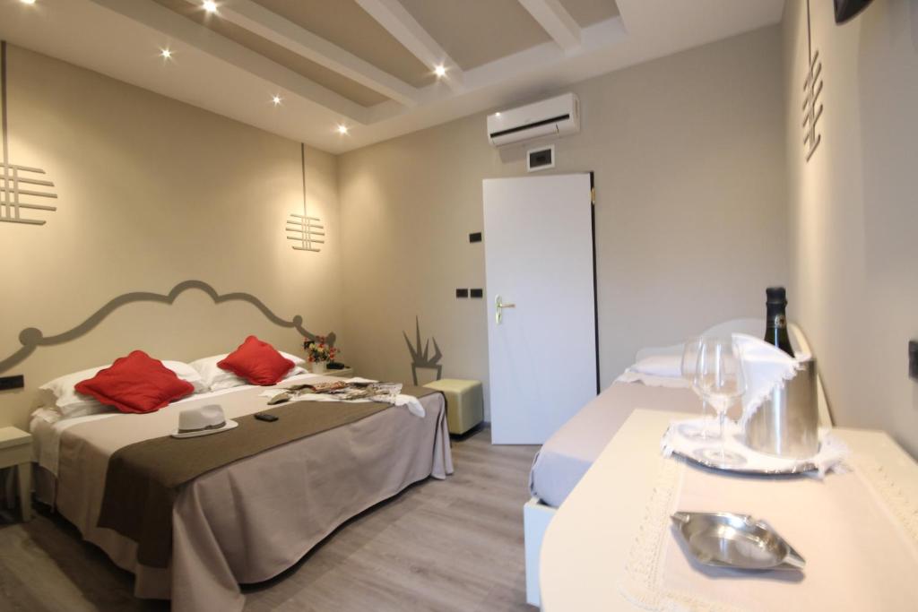 Postel nebo postele na pokoji v ubytování Hotel Arabel