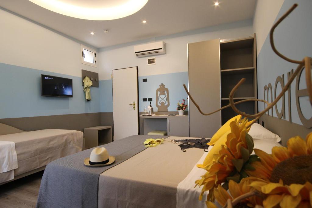 Postel nebo postele na pokoji v ubytování Hotel Arabel