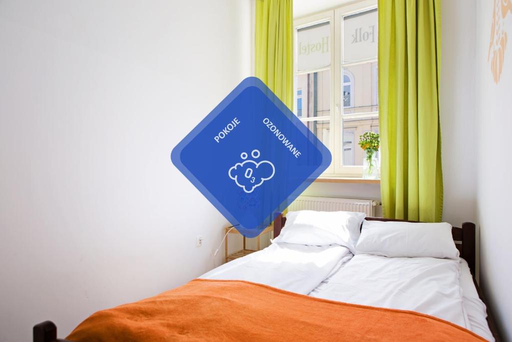 Posteľ alebo postele v izbe v ubytovaní Folk Hostel