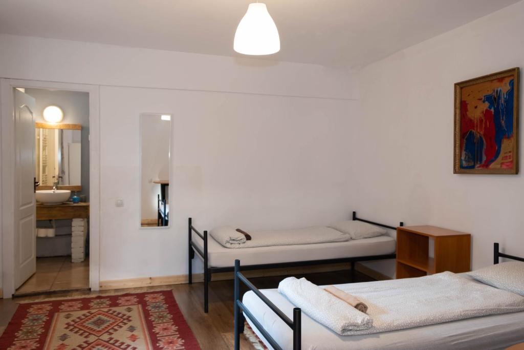 Ένα ή περισσότερα κρεβάτια σε δωμάτιο στο Zen Hostel