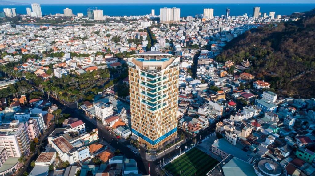 an aerial view of a city with buildings at Fusion Suites Vung Tau in Vung Tau