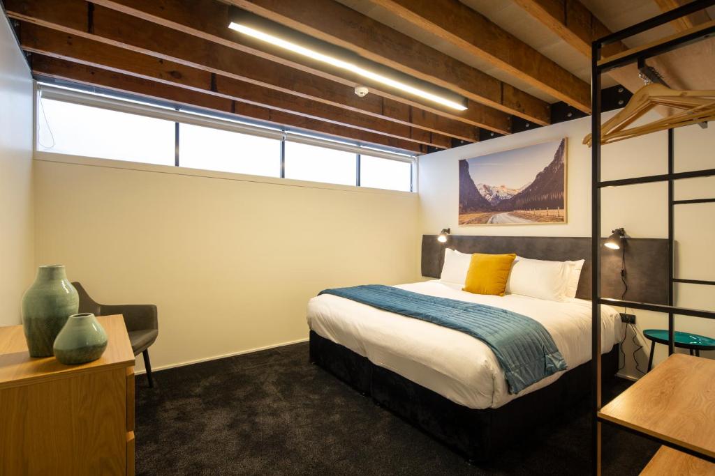 Postel nebo postele na pokoji v ubytování Koura Apartments Central Queenstown